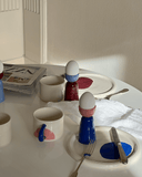 The wheel thrown and hand formed ceramic egg cups make your morning rituals a little bit more special. You can mix and match the egg cup color combinations and have a fun variety on your breakfast table. The ceramic egg cups perfectly hold a medium sized egg.
