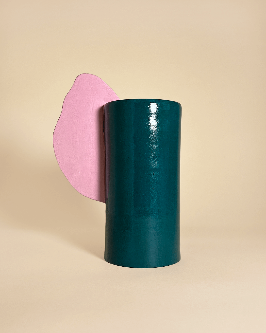 The ALA Vase is a carefully handmade limited edition by Cristina Fagnani Ceramica. The ceramic vase unites a classy body shape with organically formed elements, reminding of a wing, which means "ala“ in Italian. Whether equipped with beautiful flowers or without, this vase is definitely always an eye-catcher. The color combinations give the pieces a contrasting edge and a sculptural character. 