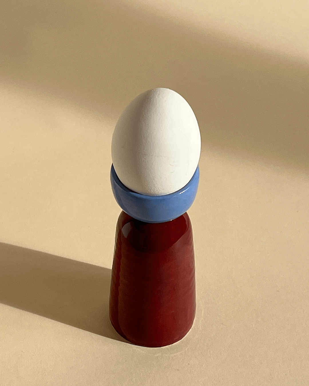 The wheel thrown and hand formed ceramic egg cups make your morning rituals a little bit more special. You can mix and match the egg cup color combinations and have a fun variety on your breakfast table. The ceramic egg cups perfectly hold a medium sized egg.