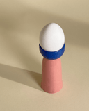 The wheel thrown and hand formed ceramic egg cups make your morning rituals a little bit more special. You can mix and match the egg cup color combinations and have a fun variety on your breakfast table. The ceramic egg cups perfectly hold a medium sized egg.