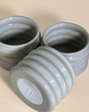 This handmade ceramic cup by Severj Studio is a classic piece with a wavy edge. As the name of the cup indicates, offers the shape a comfortable grip. The large size can be used for drinks, either hot or cold, or anything else.