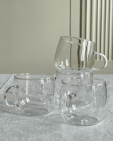 Very light and delicate glass cup with a simple yet beautiful shape.